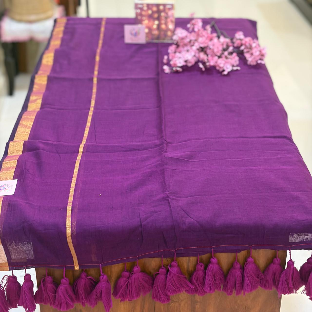Purpule mulmul with zari border