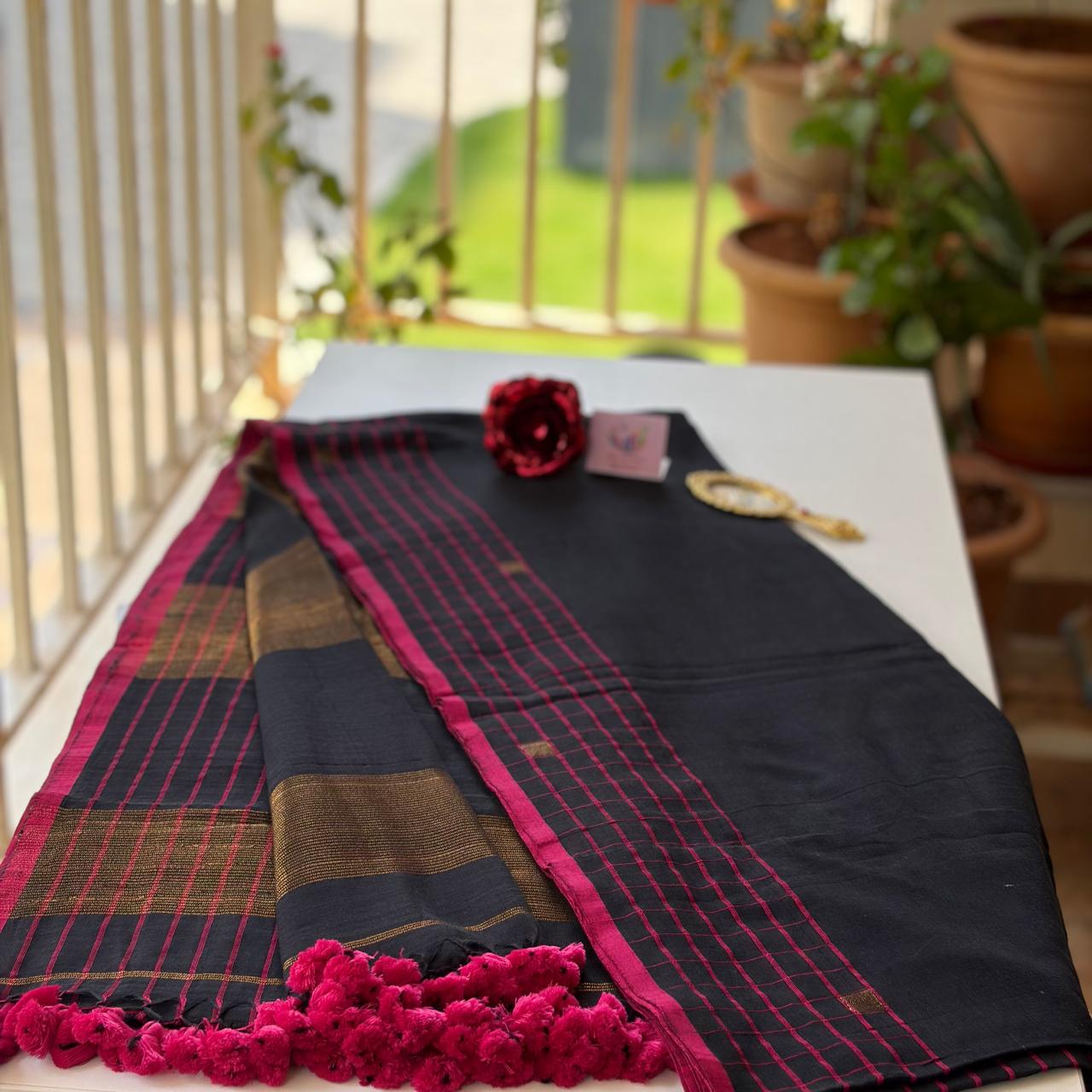 Black mulmul with chequered border & zari pallu